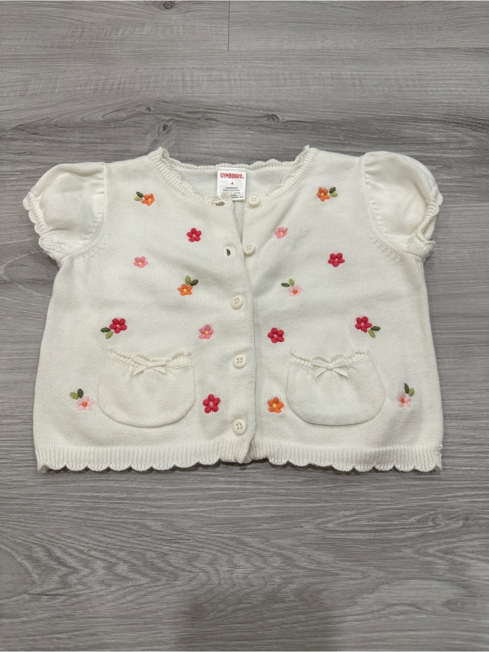 Kids white button-front top with floral embroidery